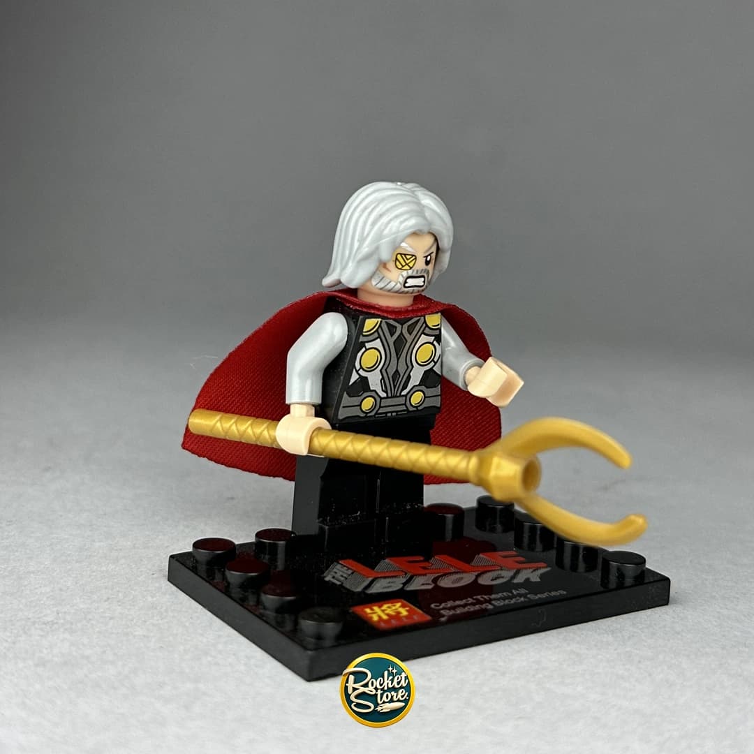 Minifigura tipo LEGO Marvel Odín Padre de Todo con Tridente Dorado