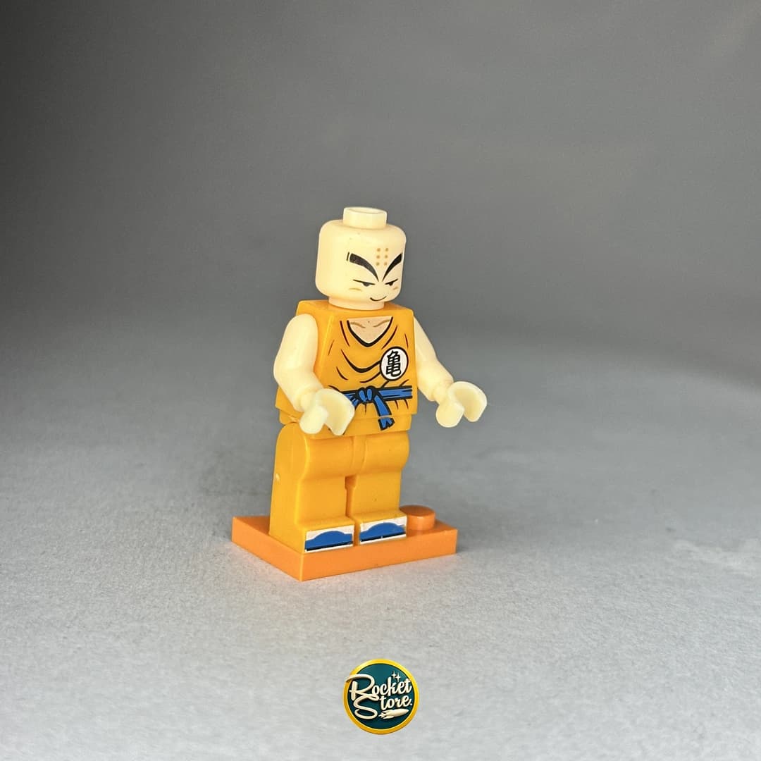 Minifigura tipo LEGO Dragon Ball Krillin en Gi Naranja de Kame