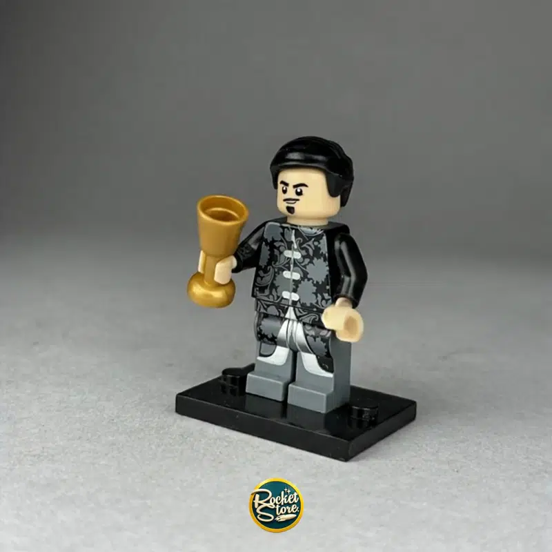 Minifigura tipo LEGO Tony Stark Elegante con Copa Dorada