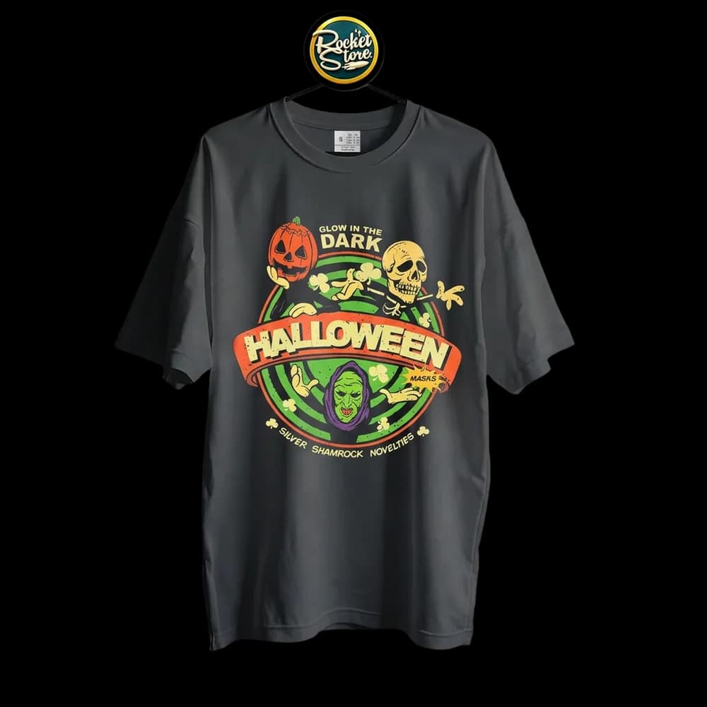 Camiseta Halloween III - Máscaras Silver Shamrock Glow in the Dark - Foto 2