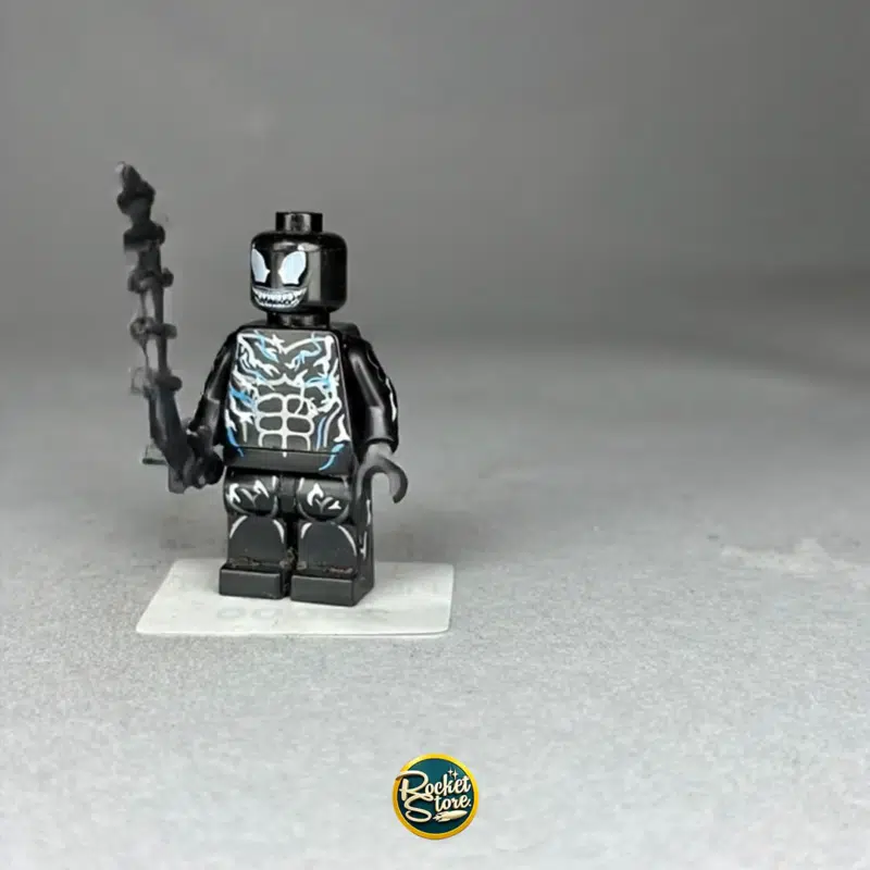 Minifigura tipo LEGO Marvel Agent Venom Simbionte con Fusil Táctico