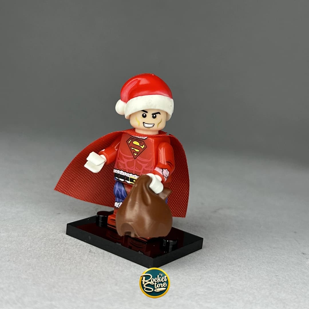 Minifigura tipo LEGO DC Comics Superman Navideño Santa con Saco